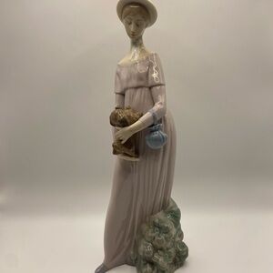 SOLD LLADRO Woman Holding Dog Figurine #4994